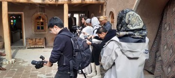 بازدید گروه ۱۱ نفره اینفلوئنسرهای چینی از برج تاریخی رادکان