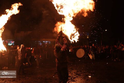 آیین پولکه‌گردانی در عجب‌شیر