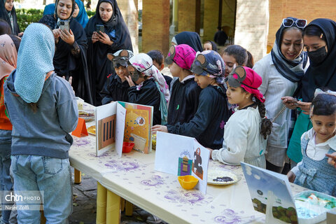 جشنواره کتاب‌های خوشمزه در باغ، عمارت نظری همدان