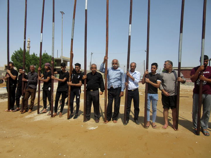 آیین کهن علم‌شویی در بندرعباس؛ تجلی پیوند آب، ایمان و سنت