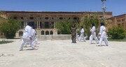 ورزشکاران رشته کاراته در چهارمحال و بختیاری حرکات نمایشی در مجموعه فرهنگی‌تاریخی قلعه چالشتر اجرا کردند