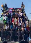تلاقی ایمان، طبیعت و میراث؛ شکوه آیین نخل‌گردانی روستای ریاب در قلب گناباد